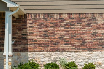 Before and After Faux Brick Siding